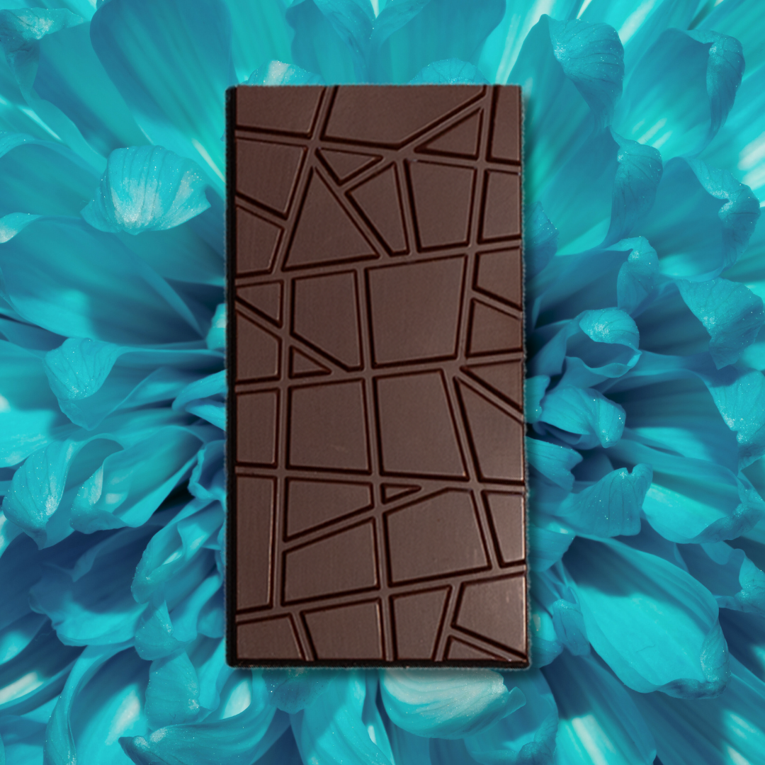 URKU Original 70% Chocolate a bar with geometric pattern on a blue textured background